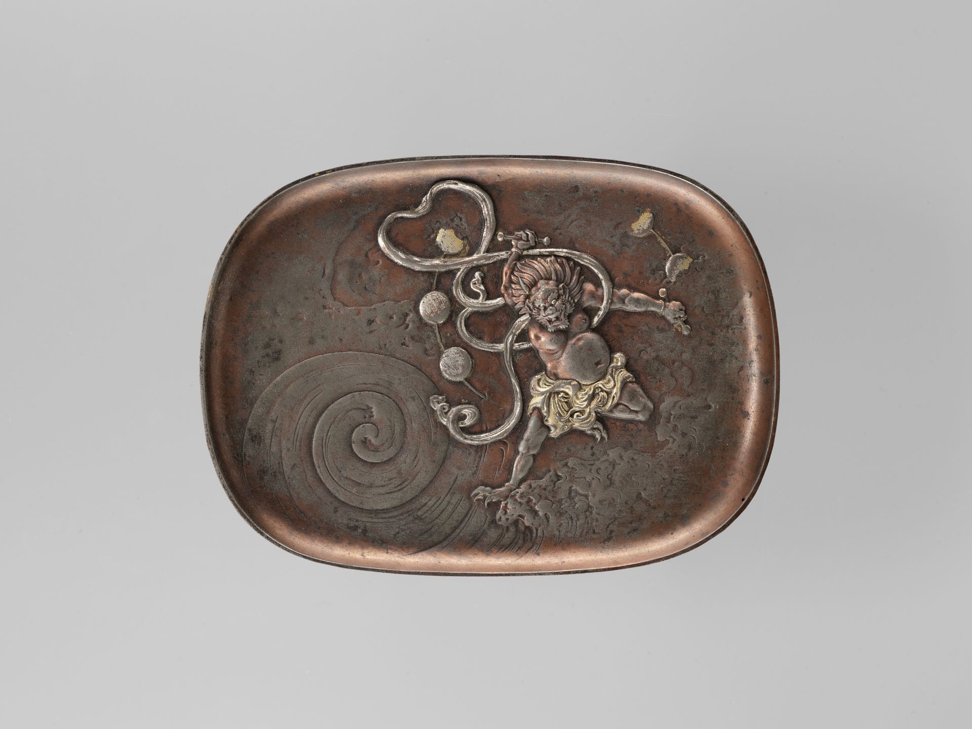 A GILT AND SILVERED COPPER TRAY DEPICTING RAIJIN