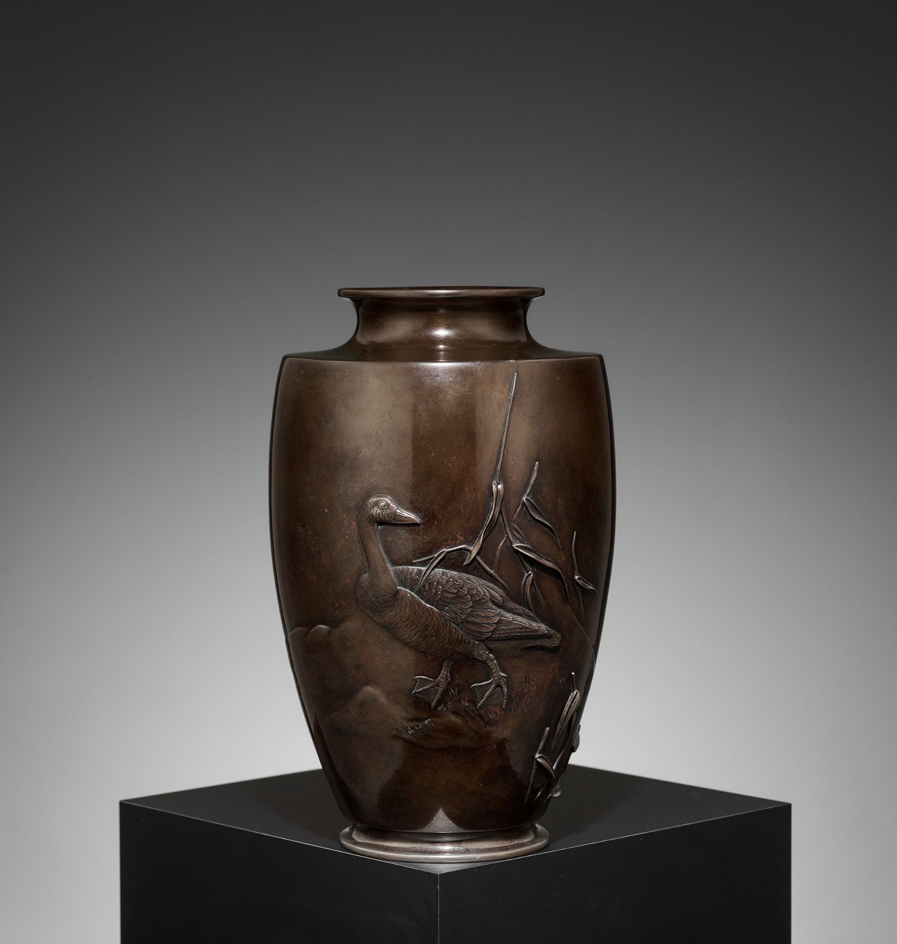 TOSHITSUGU: A FINE AND LARGE BRONZE VASE WITH GOOSE AND WATER REEDS