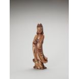 A BOXWOOD FIGURE OF GUANYIN, LATE QING