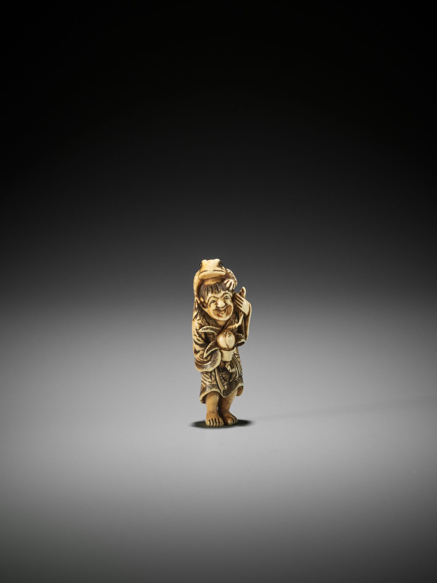 YOSHIMASA: AN IVORY NETSUKE OF GAMA SENNIN