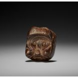 AN AMUSING AND UNUSUAL KIRI (PAULOWNIA) WOOD MASK NETSUKE OF A KAPPA