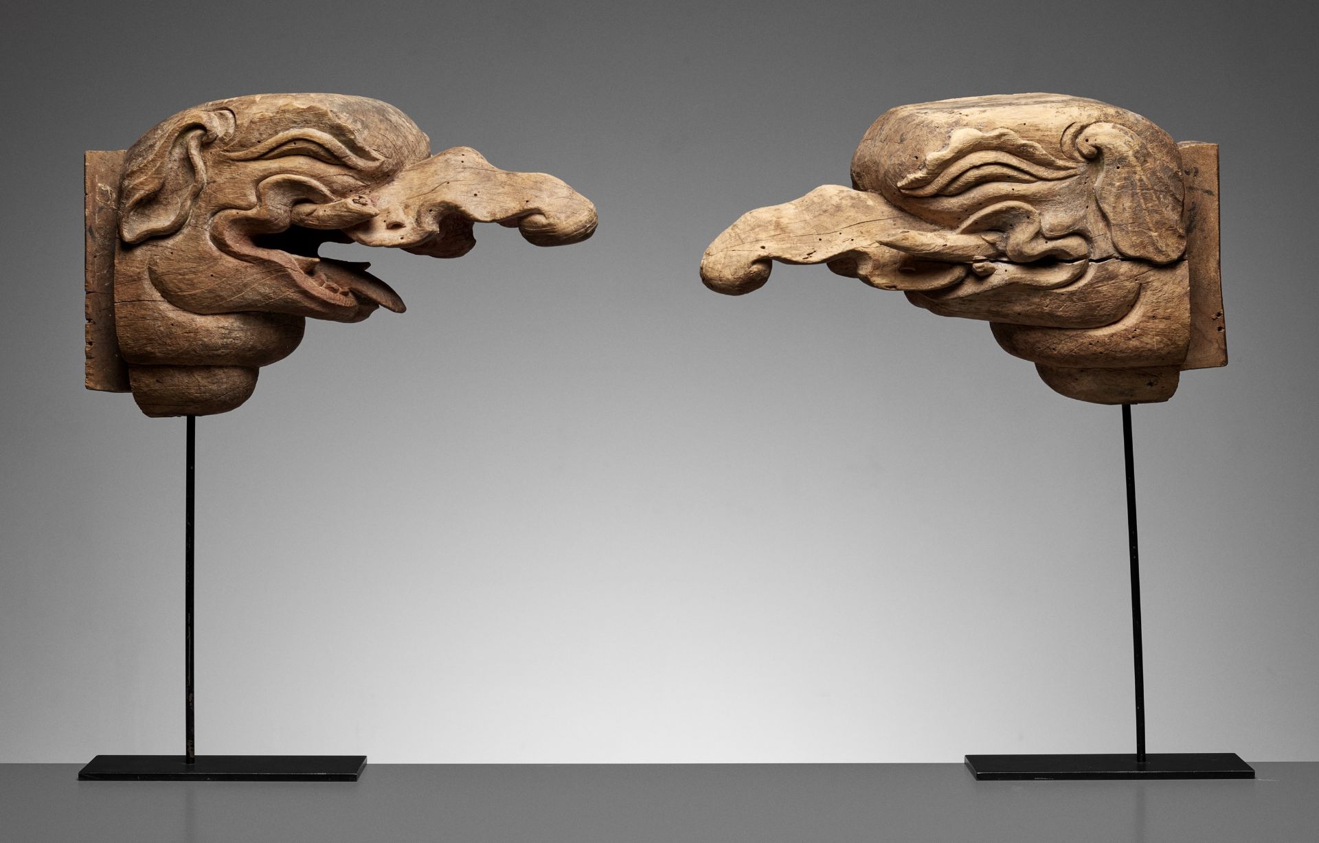 A RARE AND EARLY PAIR OF CARVED WOOD 'BAKU' ARCHITECTURAL ELEMENTS