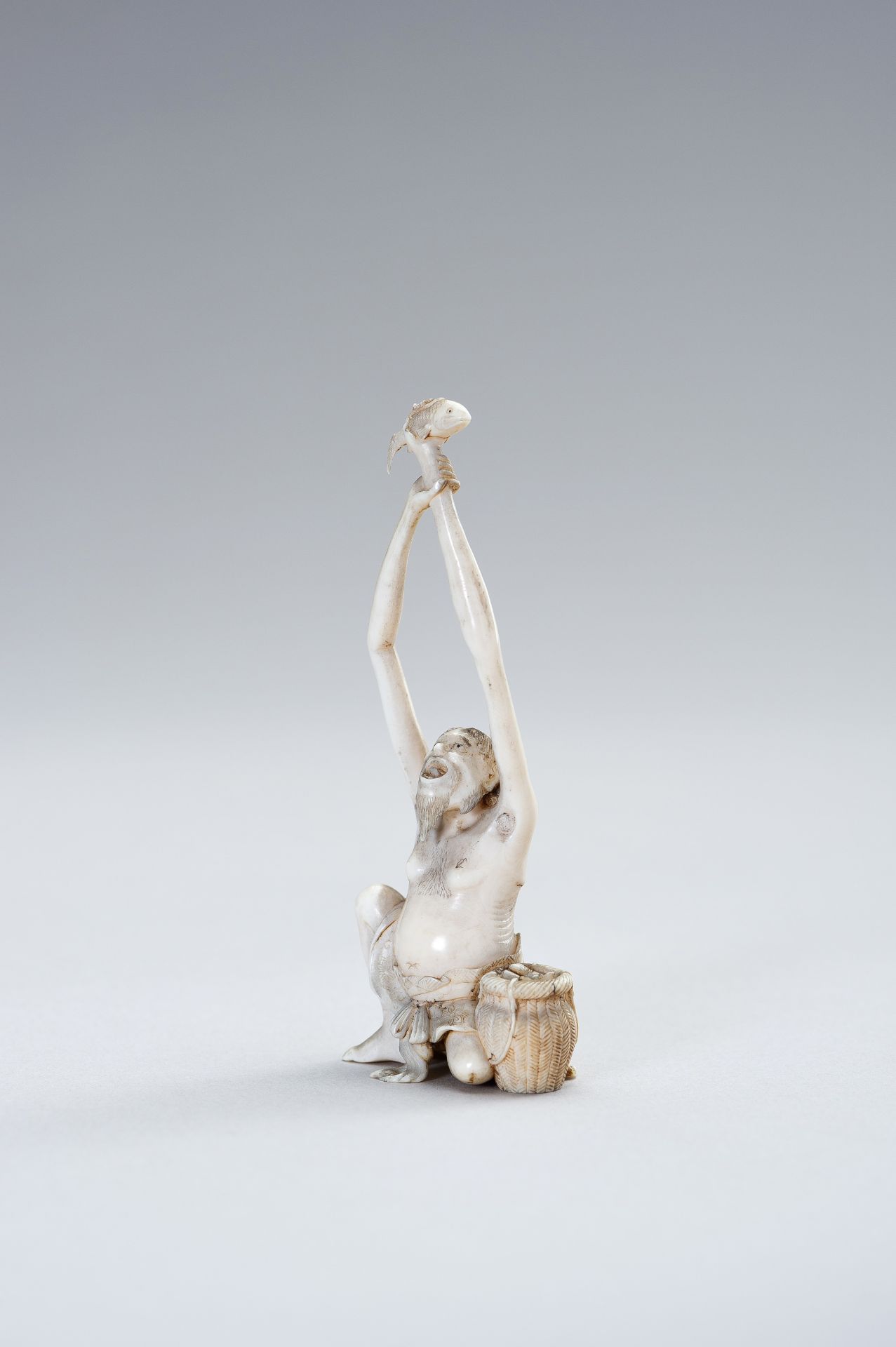 AN IVORY OKIMONO OF TENAGA - Image 6 of 13