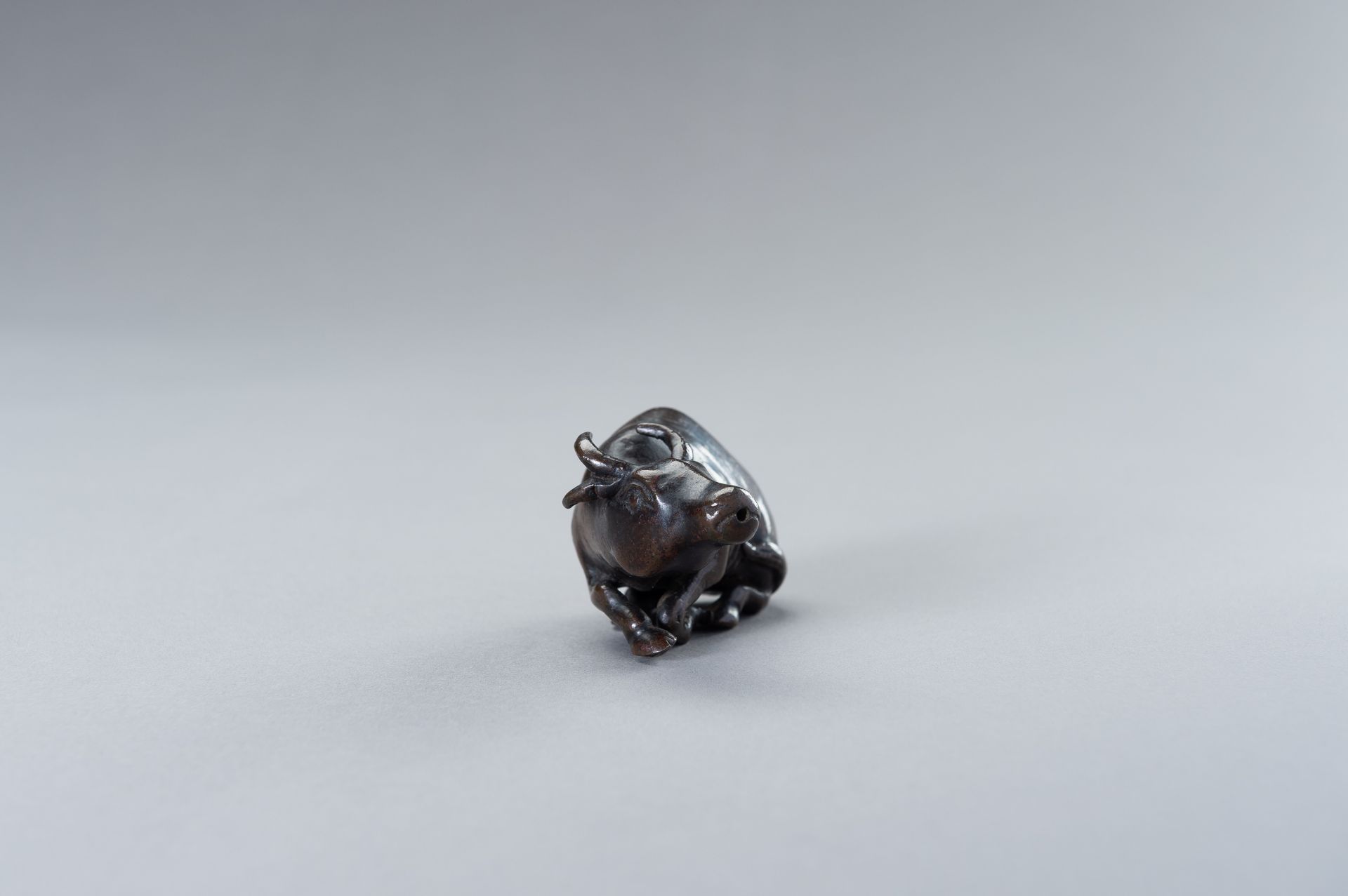 A CHINESE BRONZE FIGURE OF A WATER BUFFALO - Image 4 of 10