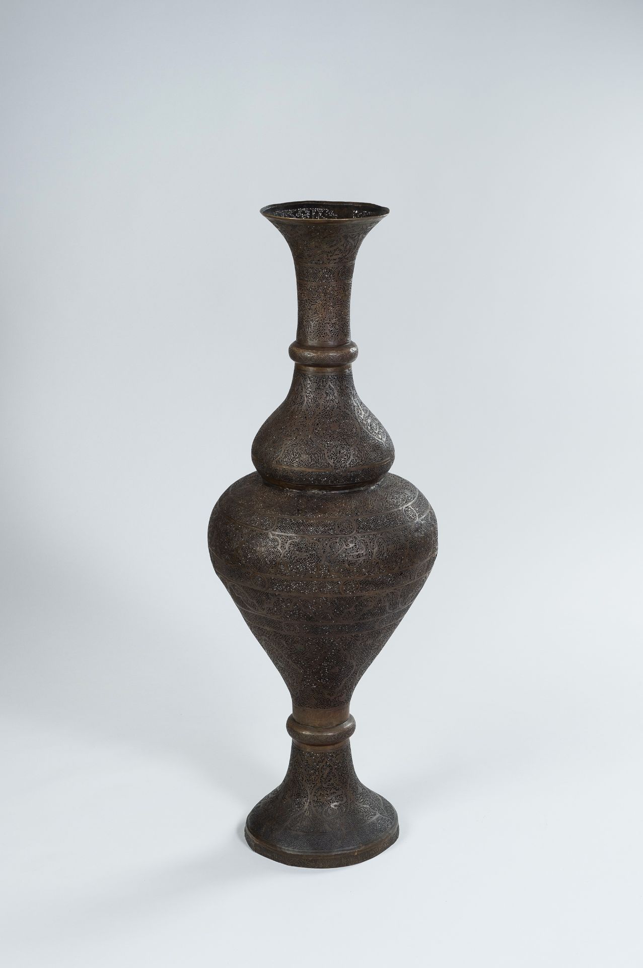 A VERY LARGE PERSIAN RETICULATED BRONZE VASE