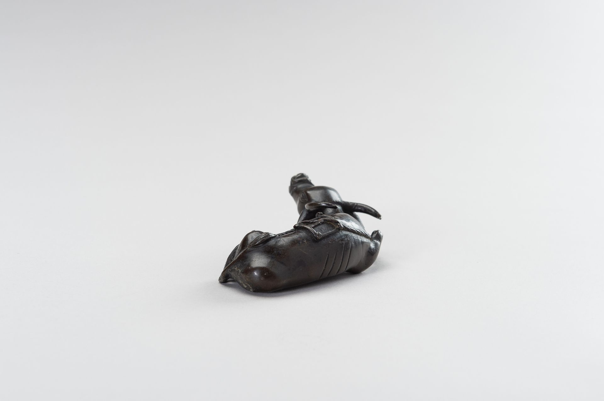 A CHINESE BRONZE FIGURE OF A TAMED WATER BUFFALO - Image 5 of 11