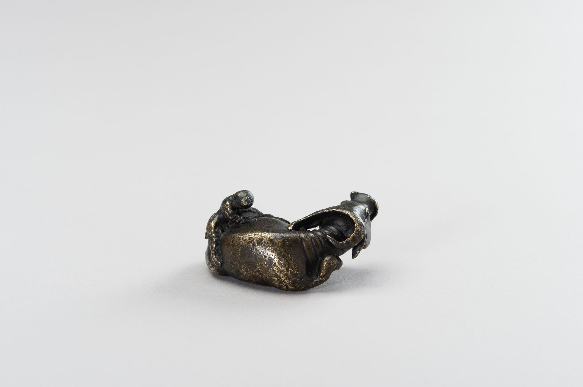 A FIGURAL BRONZE PAPERWEIGHT IN THE SHAPE OF A WATER BUFFALO AND HERDER - Image 9 of 10