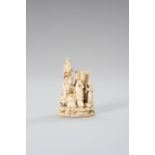 A SMALL IVORY FIGURE OF TWO LADIES