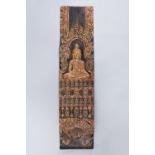 A LARGE CARVED WOOD PANEL DEPICTING BUDDHA