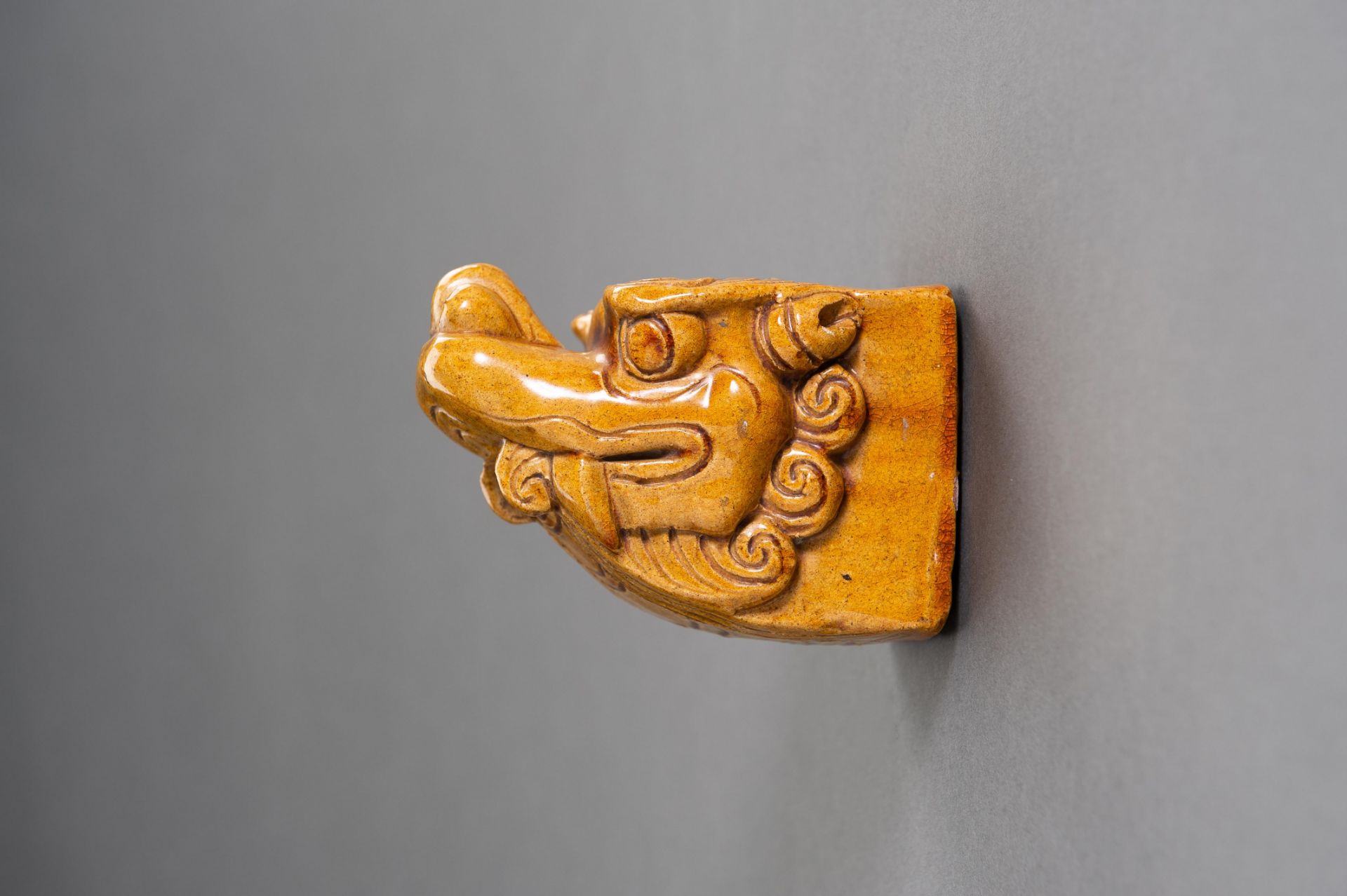 A GLAZED 'BUDDHIST LION' ARCHITECTURAL ELEMENT