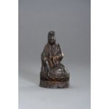 A BRONZE FIGURE OF GUANYIN