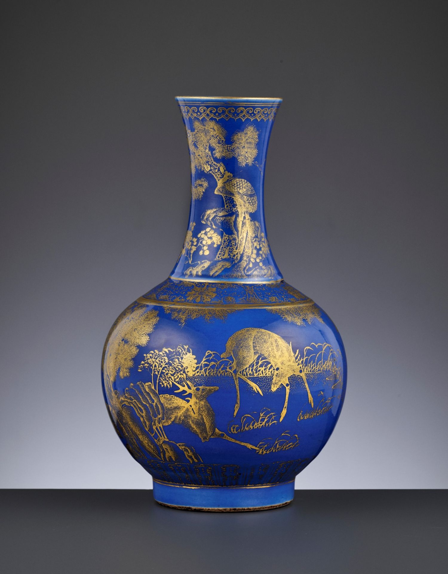 A POWDER-BLUE-GROUND GILT-DECORATED 'DEER AND CRANE' BOTTLE VASE, GUANGXU MARK AND PERIOD