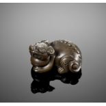 A HEAVY BRONZE 'LION' WEIGHT, MING DYNASTY