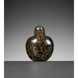 A GOLD-FLECKED BLACK GLASS SNUFF BOTTLE, 1700-1770