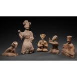 AN EXTREMELY RARE GROUP OF FIVE POTTERY MUSICIANS AND DANCERS, HAN DYNASTY