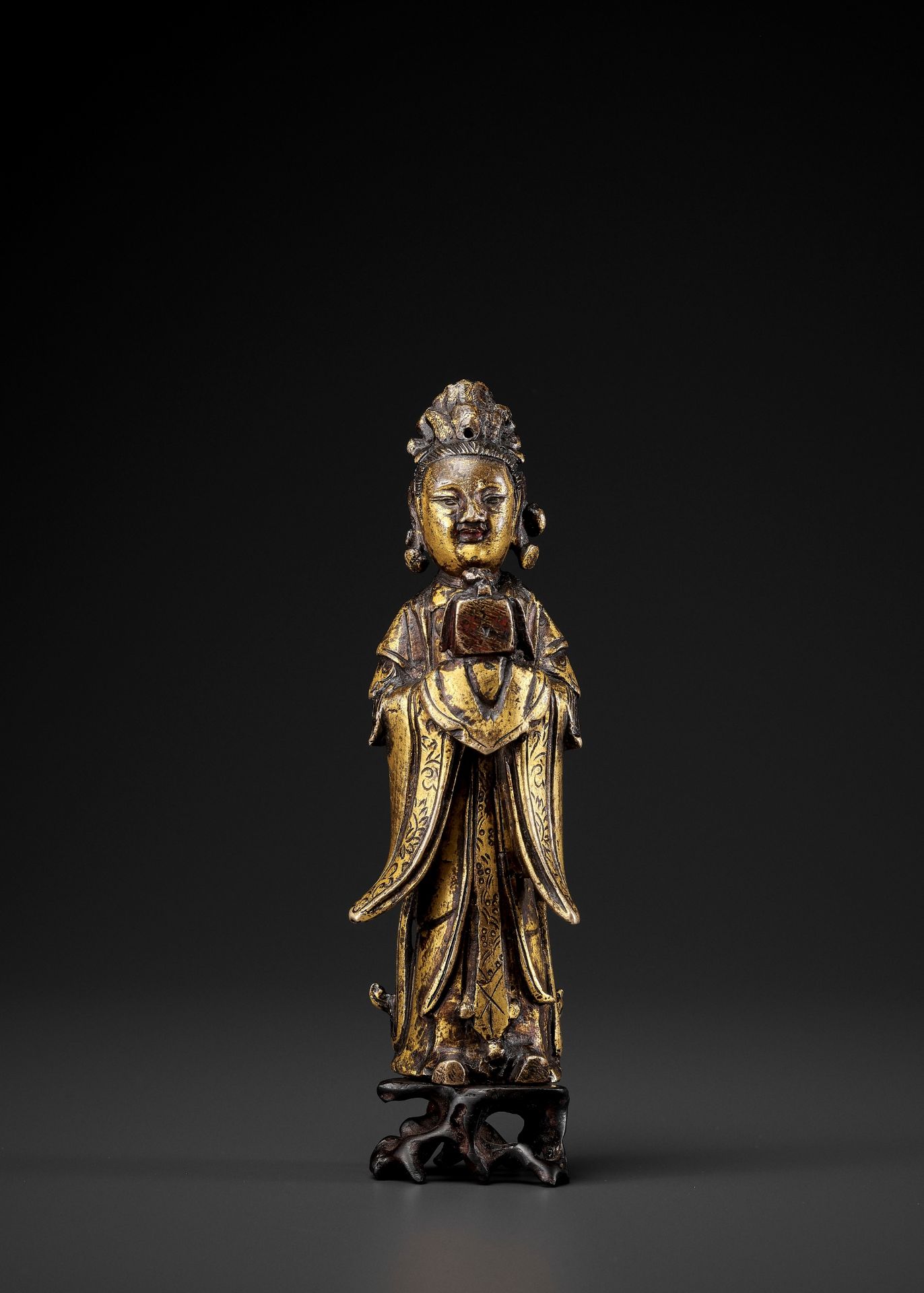 A GILT-BRONZE FIGURE OF A LADY, MING DYNASTY