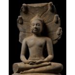 A LOPBURI SANDSTONE FIGURE OF BUDDHA MUCHALINDA, 13TH CENTURY