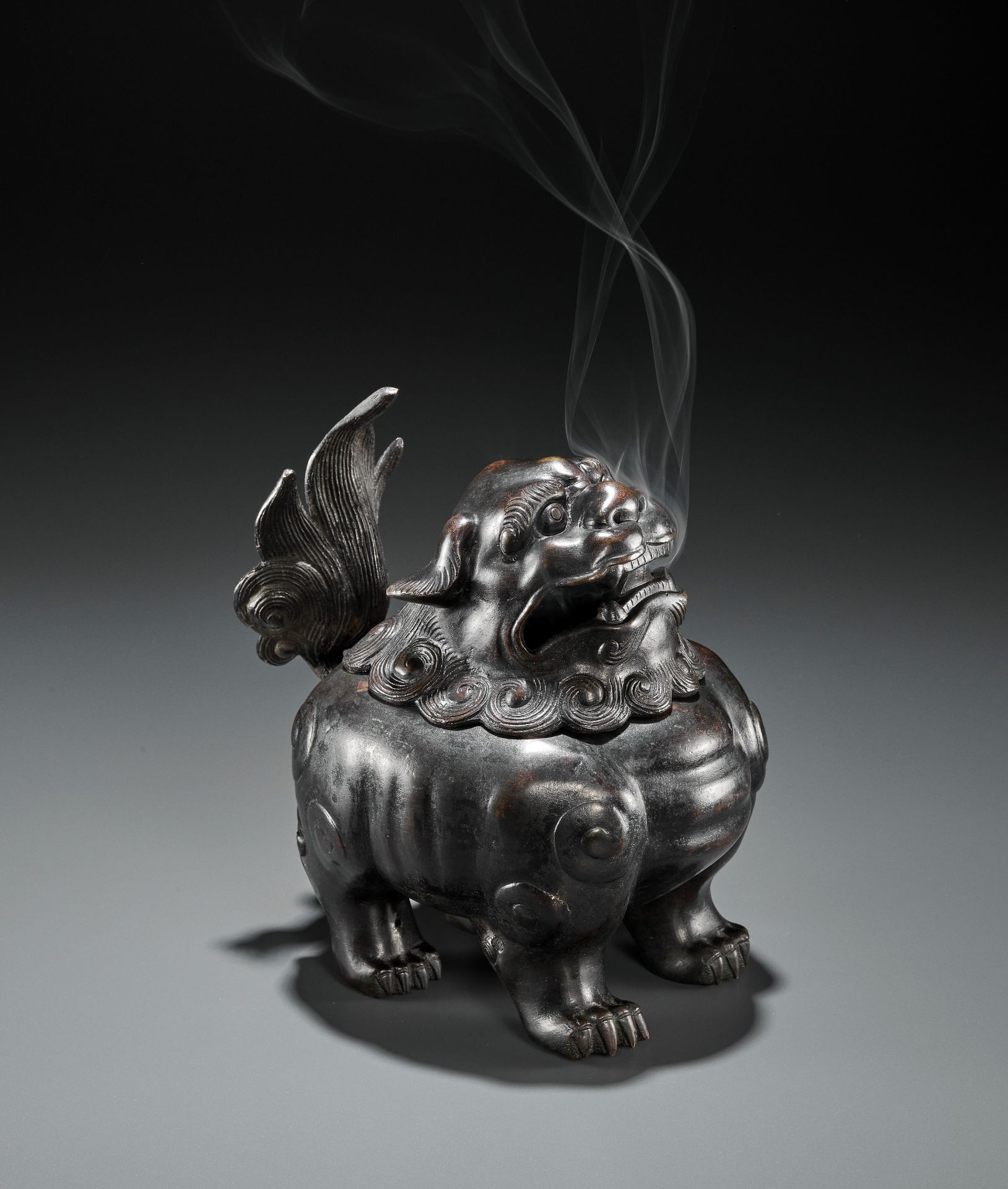 A BRONZE 'BUDDHIST LION' CENSER AND COVER, QING DYNASTY