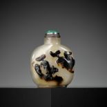 A CAMEO AGATE 'BUDDHIST LION' SNUFF BOTTLE, 1750-1850
