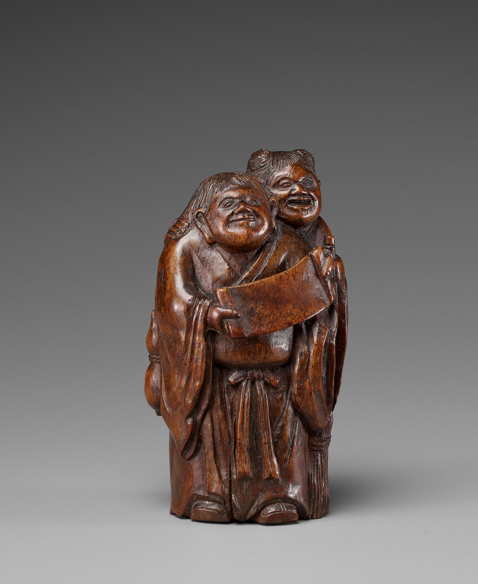 A BAMBOO CARVING OF THE HEHE ERXIAN, 18TH CENTURY