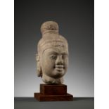 A SANDSTONE HEAD OF SHIVA, CHAM PERIOD