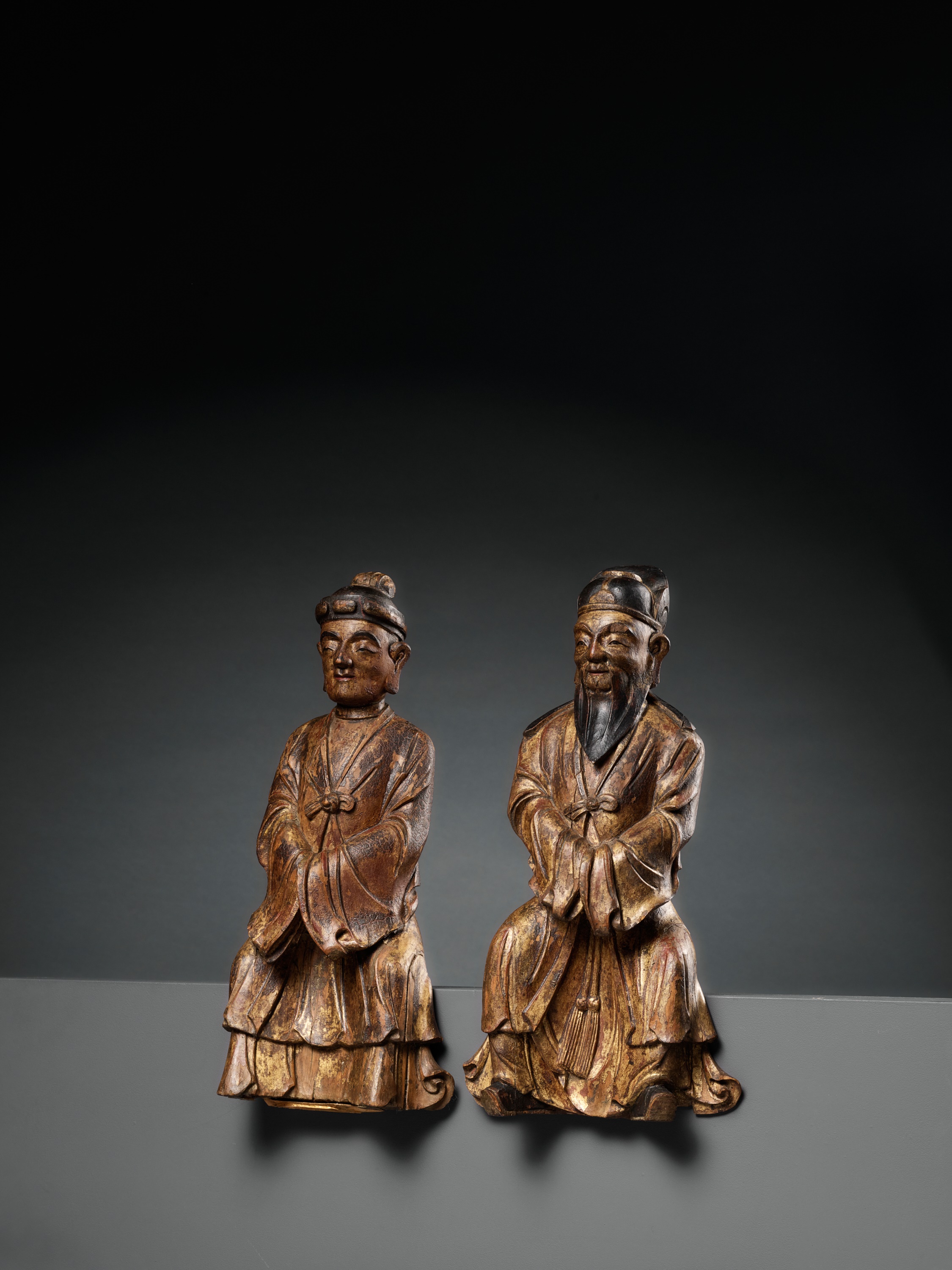 A PAIR OF GILT-LACQUERED HARDWOOD FIGURES OF DAOIST IMMORTALS, MING DYNASTY - Image 7 of 10
