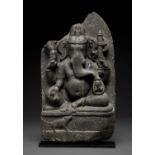 A BLACK STONE STELE OF GANESHA, PALA PERIOD