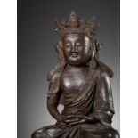 A MASSIVE BRONZE FIGURE OF AVALOKITESHVARA, DATED THIRD YEAR OF JIAJING, CORRESPONDING TO 1524