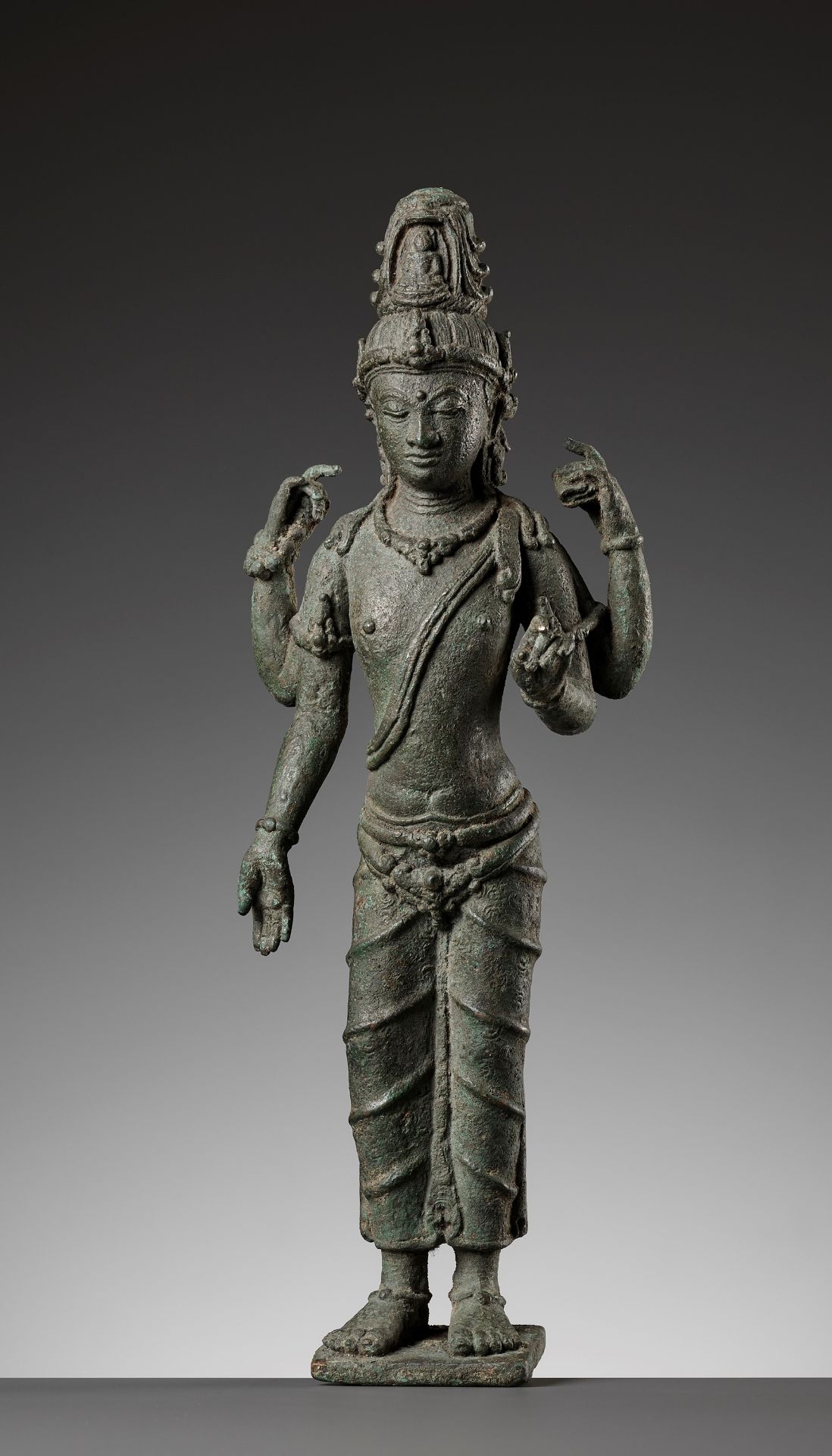 A RARE BRONZE FIGURE OF AVALOKITESHVARA, SRIVIJAYA PERIOD