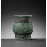 A BRONZE RITUAL WINE CUP, ZHI, LATE SHANG TO EARLY WESTERN ZHOU