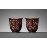 A PAIR OF RARE FORM TIXI LACQUER TALL CUPS, MING DYNASTY