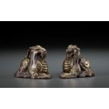 A PAIR OF GILT BRONZE 'MYTHICAL BEAST' WEIGHTS, EASTERN ZHOU TO WESTERN HAN