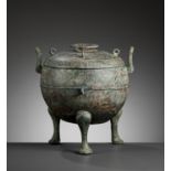 A LARGE ARCHAIC BRONZE RITUAL FOOD VESSEL AND COVER, DING, WARRING STATES