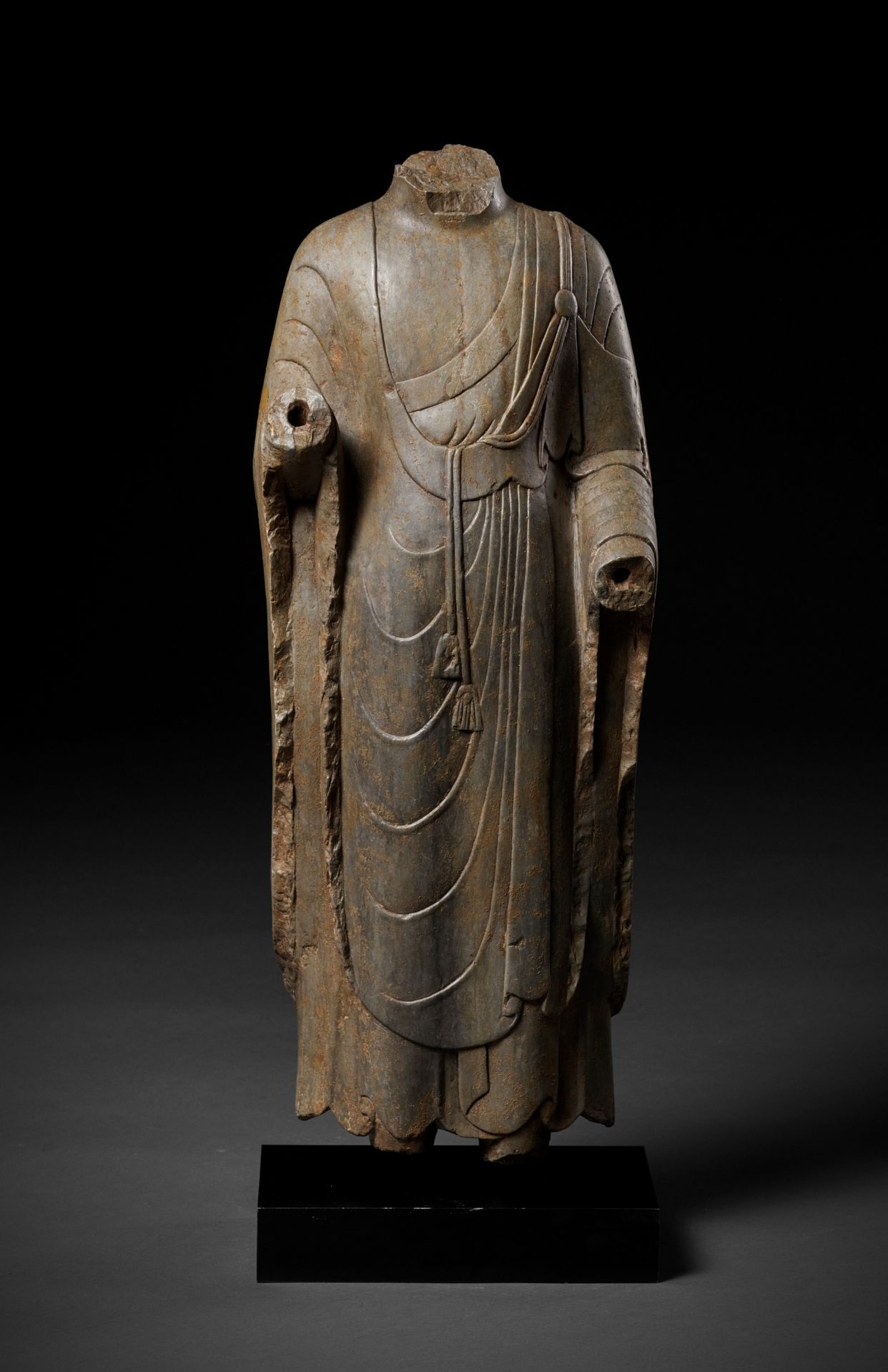 A LIMESTONE TORSO OF BUDDHA, NORTHERN QI DYNASTY