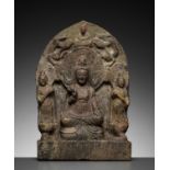 A LIMESTONE BUDDHIST TRIAD STELE OF GUANYIN, NORTHERN WEI TO TANG DYNASTY