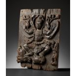 A RARE WOOD PANEL DEPICTING GARUDA WITH VIBHAVASU AND SUPRATIK