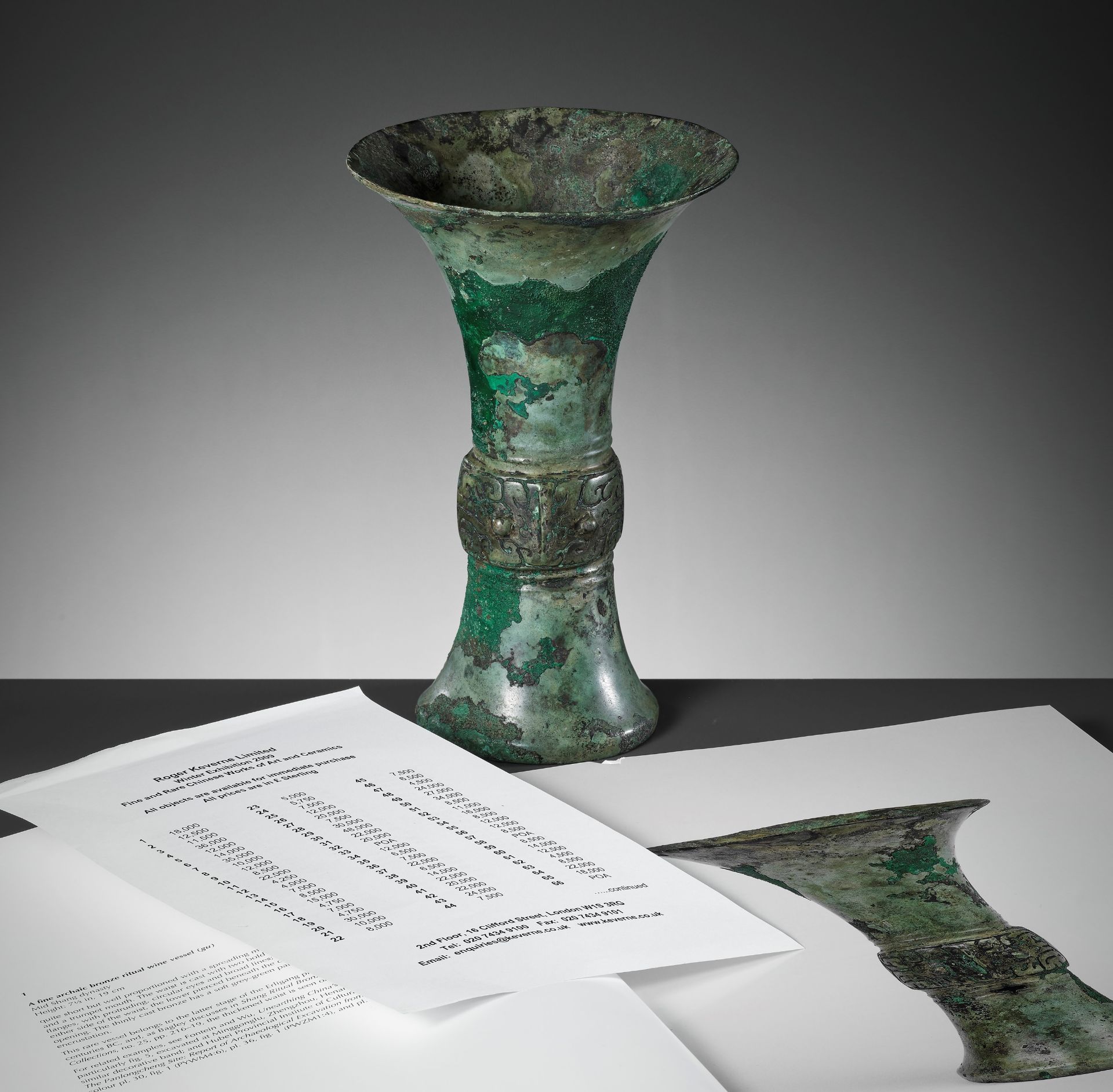 A RARE BRONZE RITUAL WINE VESSEL, GU, SHANG DYNASTY