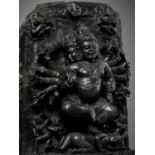 A LARGE BLACK STONE STELE OF MAHAKALA