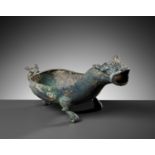 A RARE BRONZE 'ROARING BULL' POURING VESSEL, YI, SPRING AND AUTUMN PERIOD