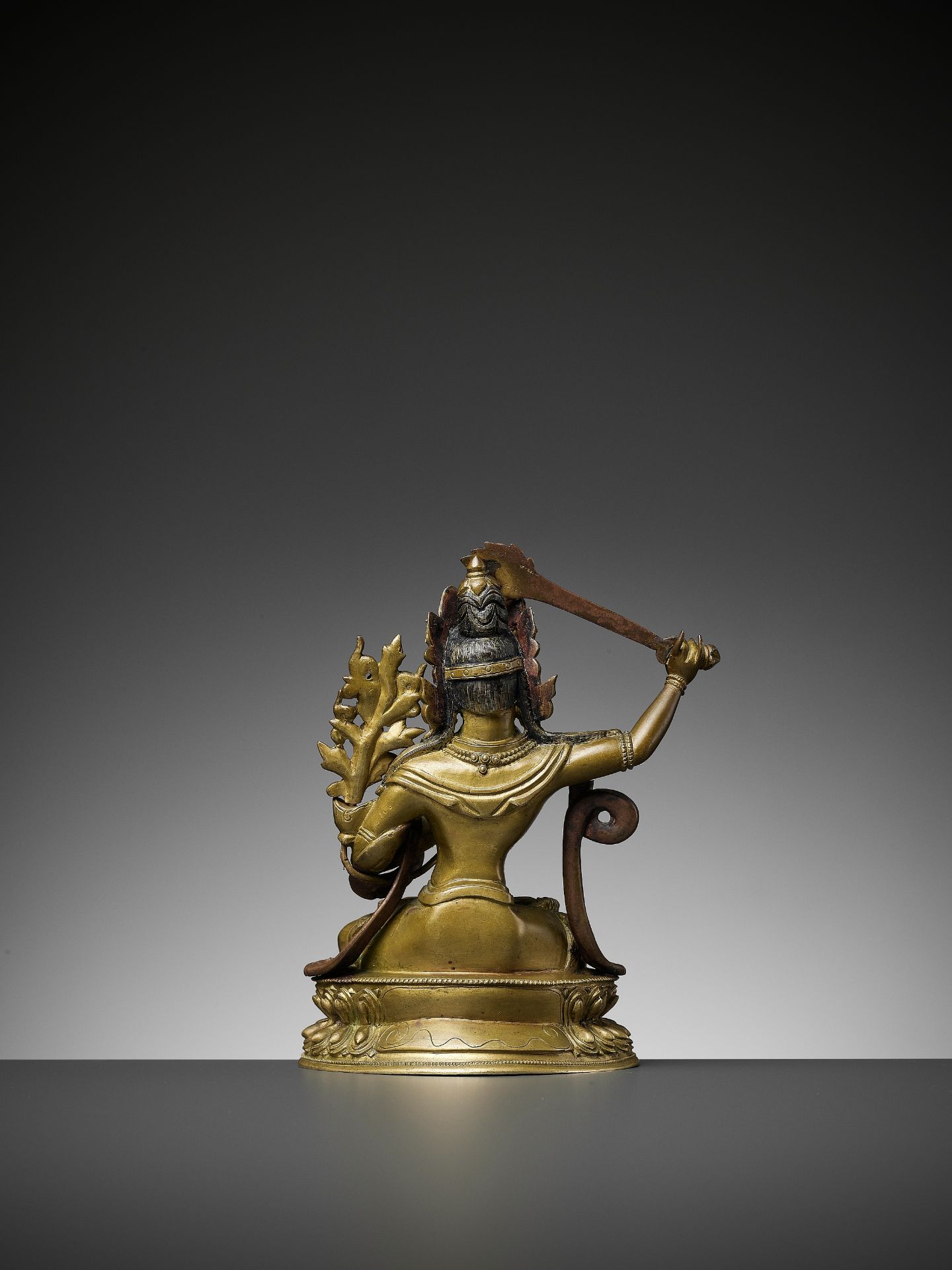 A GILT BRONZE FIGURE OF MANJUSHRI, QIANLONG - Bild 7 aus 11