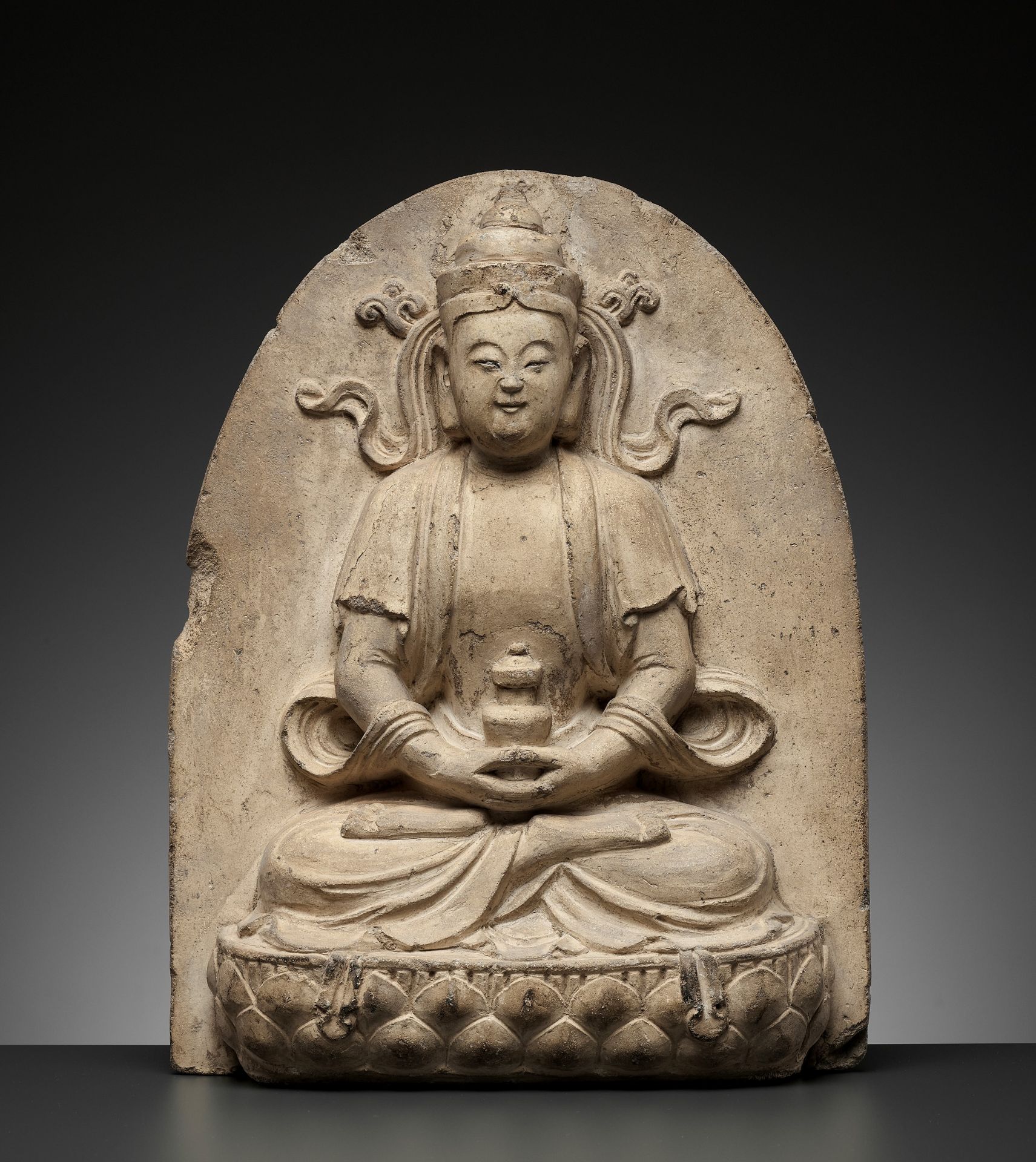 A MASSIVE 'BODHISATTVA' ARCHITECTURAL ELEMENT, UNGLAZED POTTERY, MING DYNASTY