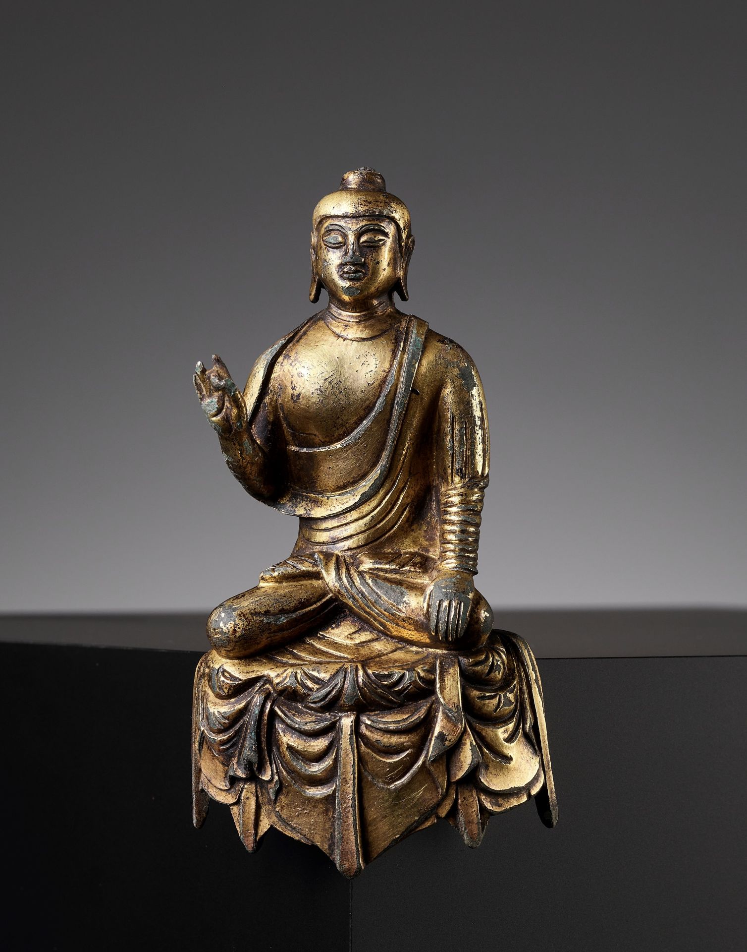A MAGNIFICENT AND RARE GILT-BRONZE FIGURE OF BUDDHA, TANG DYNASTY