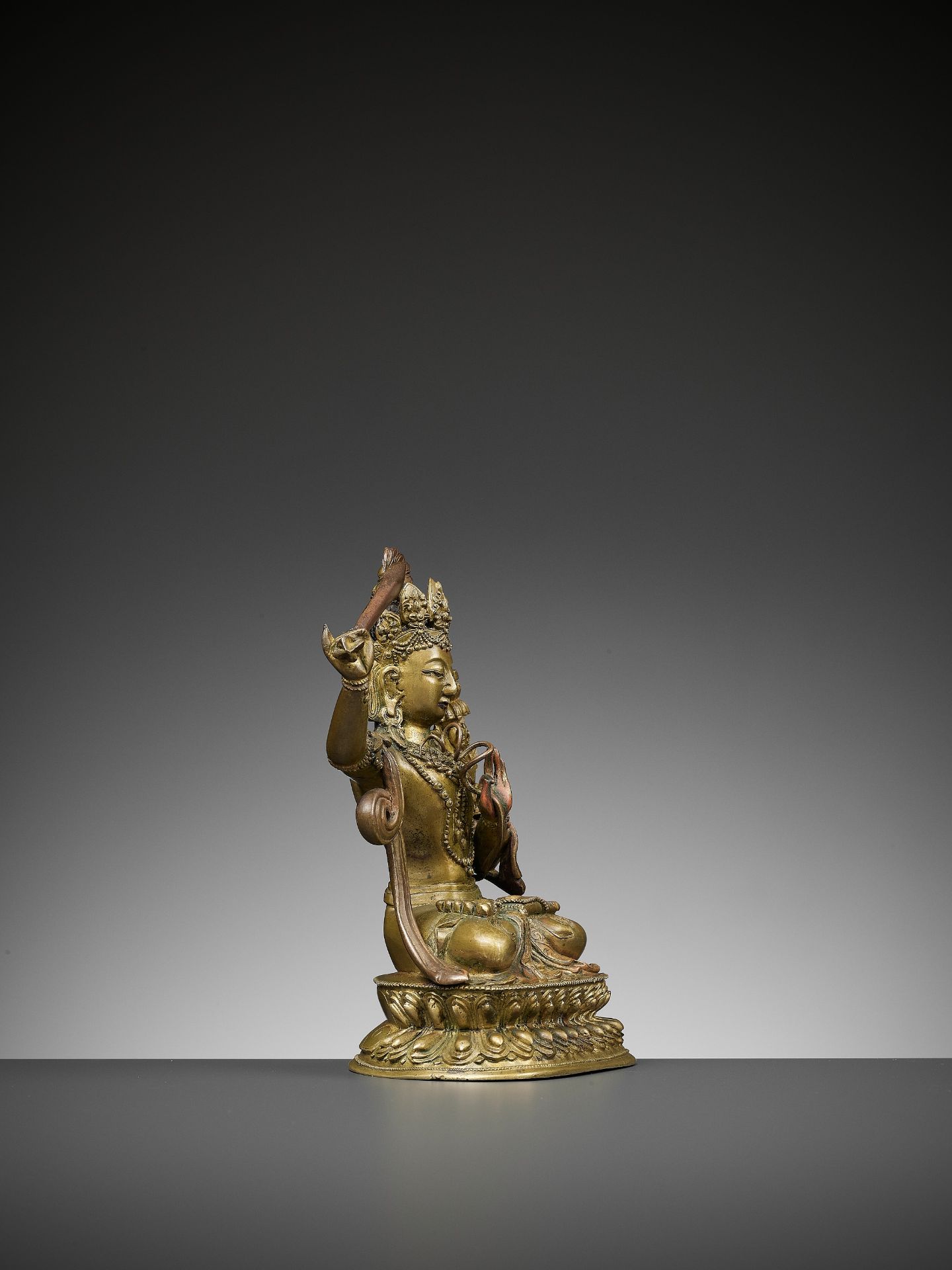 A GILT BRONZE FIGURE OF MANJUSHRI, QIANLONG - Bild 8 aus 11