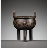 A GILT AND SILVER-INLAID BRONZE 'ARCHAISTIC' CENSER, DING, LATE MING TO EARLIER QING