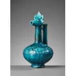 A KASHAN TURQUOISE-GLAZED ZOOMORPHIC POTTERY EWER