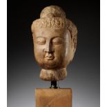 A MARBLE HEAD OF BUDDHA, TANG DYNASTY