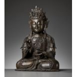 A LARGE BRONZE FIGURE OF GUANYIN, LATE MING DYNASTY