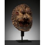 A LACQUERED WOOD HEAD OF NARASIMHA, 18TH CENTURY