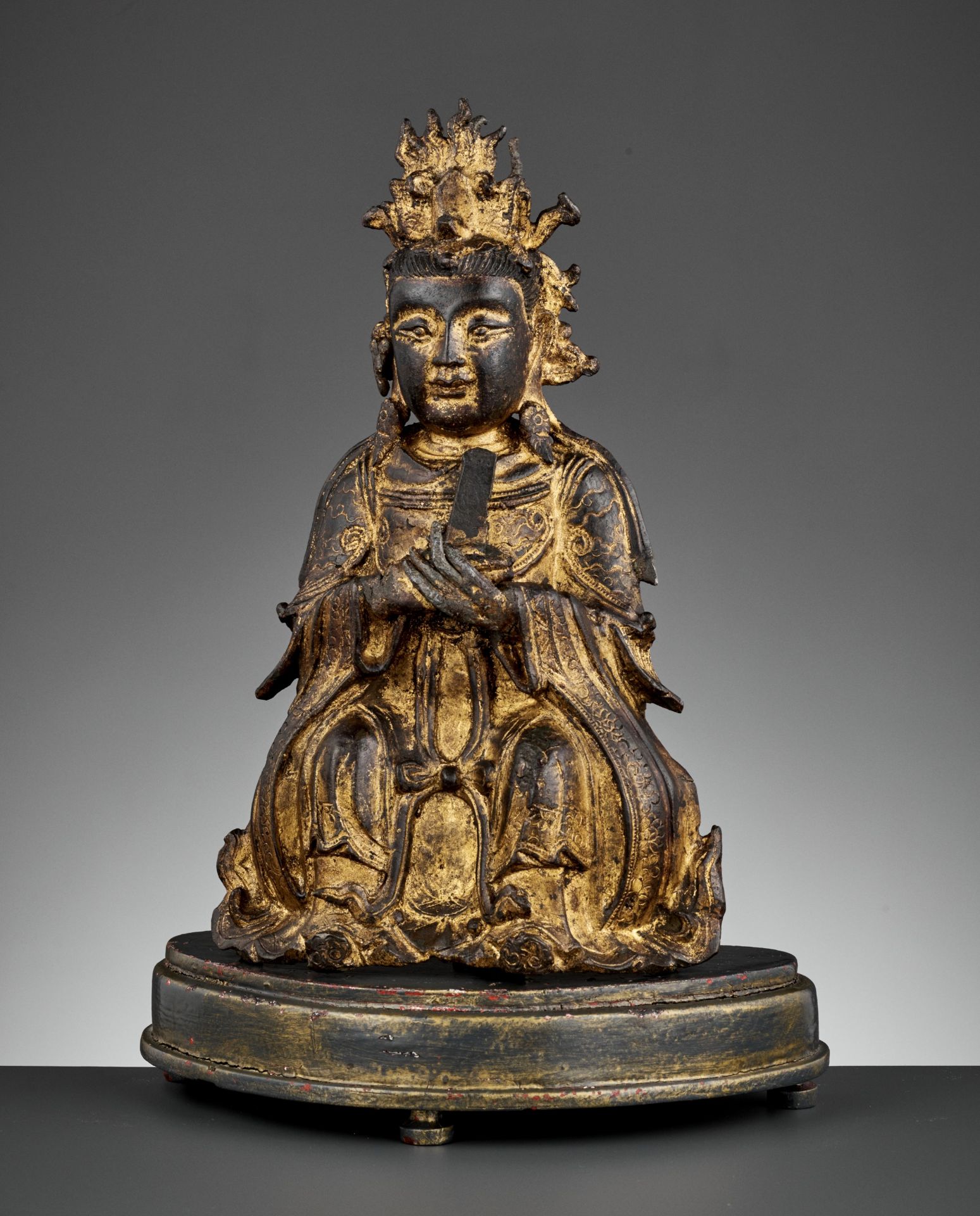 A GILT BRONZE FIGURE OF BIXIA YUANJUN, MING DYNASTY