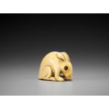 A KYOTO SCHOOL IVORY NETSUKE OF A HARE